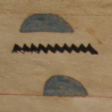 Hieroglyph of water in black colour. Coffin of the Middle Kingdom. Bahr el-Yussef Museum. Photo: Mª Rosa Valdesogo Martín