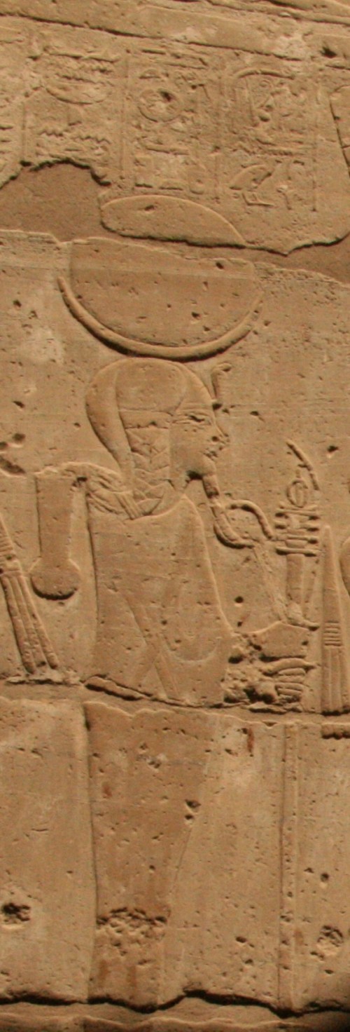 Khonsu with side lock and lunar head-dress. Relief from the funerary temple of Seti I in Dra Abu el-Naga. XIX Dynasty. Photo: Mª Rosa Valdesogo Martín.