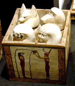 Canopic chest of priest of Montu Pady-Imenet. Neith pouring water on Qebehsenuef, the son of Horus who protected the intestines. XXII Dynasty.Luxor Museum. Ancient Egypt.